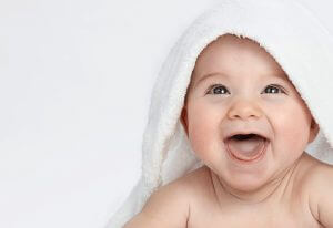 baby-laughing-under-a-towel